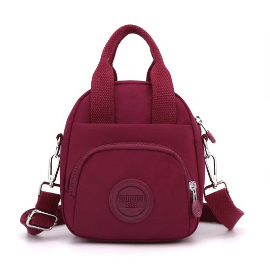 NNEDSZ Red Mini Waterproof Nylon Backpack - Lightweight Casual Crossbody Bag-0
